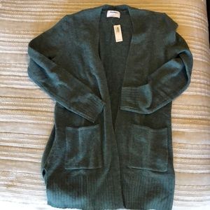 Green open front cardigan.  Hits mid thigh.